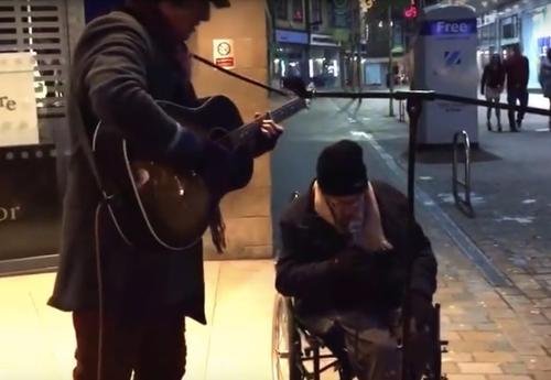 When a homeless man requests to sing alongside a street performer, the audience is transfixed