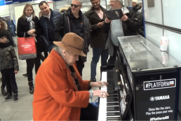 At the public piano, an elderly woman plays ragtime like a goddess