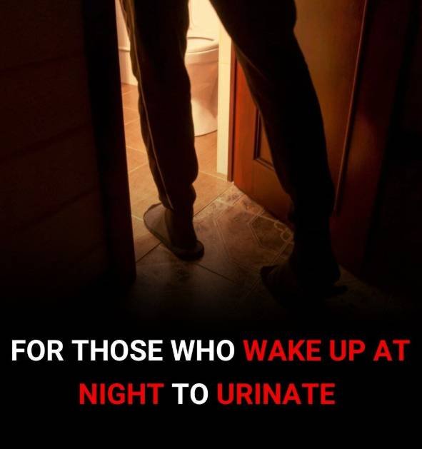 Woman awake at night heading to the bathroom, illustrating frequent nighttime urination and possible health concerns.