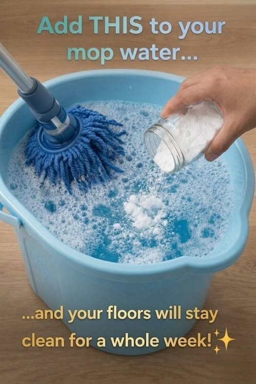A spotless floor with a mop, bucket, and baking soda nearby, symbolizing the simplicity and effectiveness of natural cleaning.