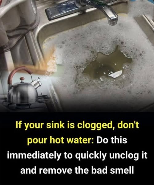 Person unclogging a kitchen sink drain using household cleaning methods
